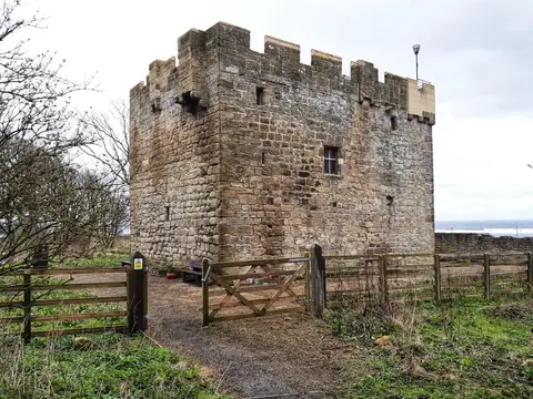 Photo of Cresswell tower house, a ruined tower house in Northumberland, north east England.