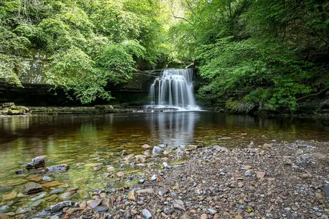 Photo of West Burton Falls, a waterfall in the Yorkshire Dales, North Yorkshire, northern England.