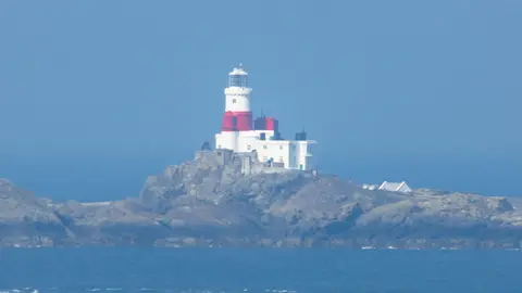 Photo of Skerries Lighthouse, a lighthouse near Cemaes, Anglesey, north Wales.
