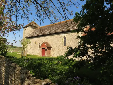 Photo of St Botolph's, Botolphs, a church in the South Downs, West Sussex, south east England.