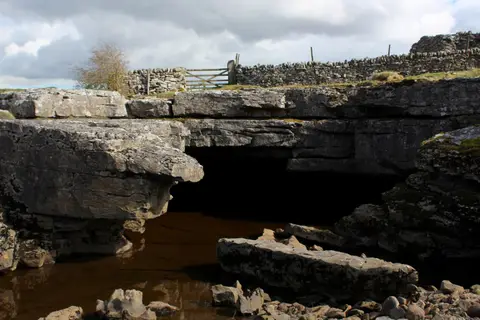 Photo of God's Bridge, a rock formation near Cotherstone in the North Pennines, County Durham, north east England.