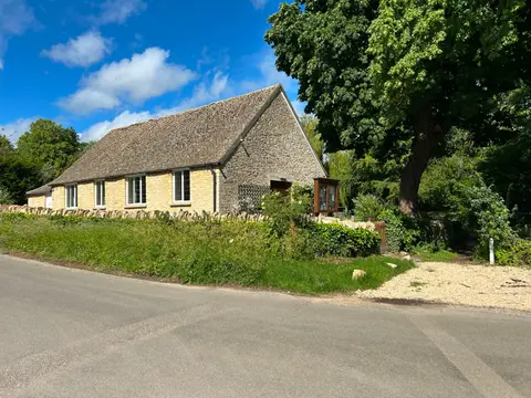 Photo of Swinbrook, a village in the Cotswolds, Oxfordshire, south east England.