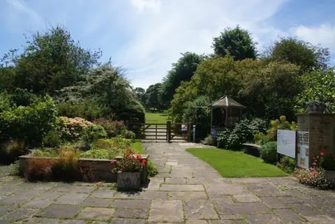 Photo of The Pines Garden, a garden near St Margaret's at Cliffe, Kent, south east England.
