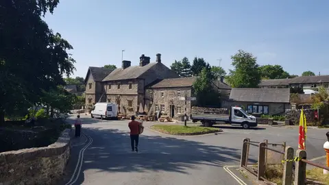 Photo of The Buck Inn (Malham), a pub in the Yorkshire Dales, North Yorkshire, northern England.