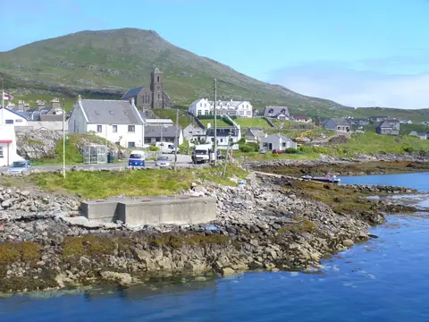Photo of Castlebay, a village in Na h-Eileanan Siar, the Scottish Highlands and Islands.