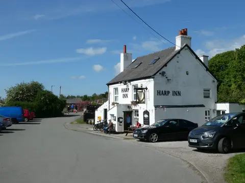 Photo of The Harp Inn, a pub near Little Neston, Cheshire, north west England.
