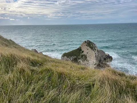 Photo of Mupe Bay, a cove near Osmington, Dorset, south west England.