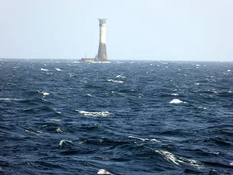 Photo of Wolf Rock Lighthouse, a lighthouse in England.