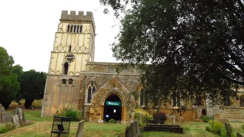 Photo of All Saints' Church, Earls Barton, a church in Northamptonshire, central England.