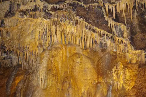 Photo of Treak Cliff Cavern, a cave near Castleton in the Peak District, Derbyshire, central England.