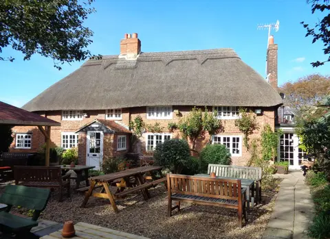 Photo of The Gribble Inn, a pub near Oving, West Sussex, south east England.