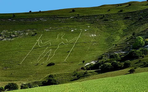 Photo of Long Man of Wilmington, a hill figure in the South Downs, East Sussex, south east England.