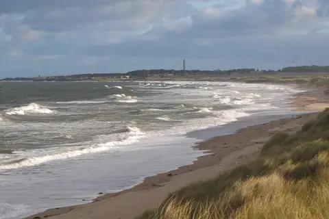 Photo of the coast at Druridge Bay, Northumberland, north east England.