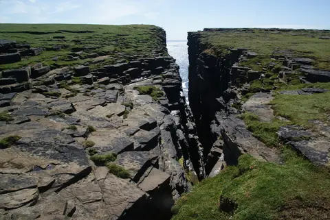 Photo of Ramni Geo, a chambered tomb near Pierowall, the Orkney Islands, the Scottish Highlands and Islands.