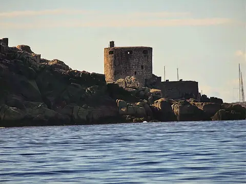 Photo of Cromwell's Castle, a ruined castle in Cornwall, south west England.