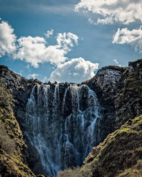 Photo of Clashnessie Falls, a waterfall in Assynt–Coigach, Highland, the Scottish Highlands and Islands.