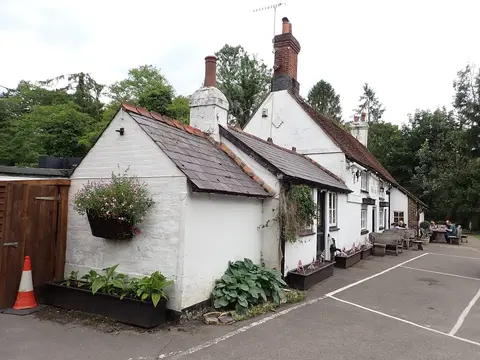 Photo of The Withies Inn, a pub near Compton, Surrey, south east England.