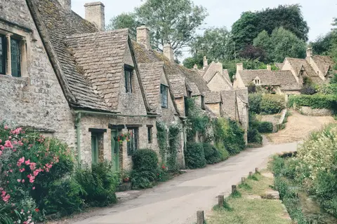 Photo of Bibury, a village in the Cotswolds, Gloucestershire, south west England.