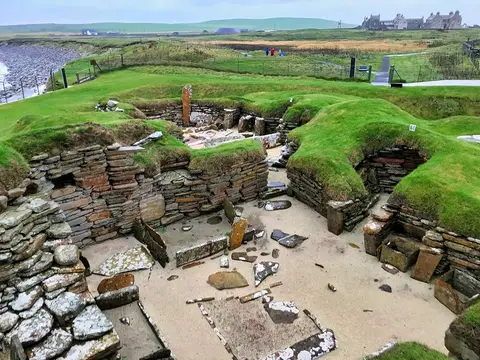 Photo of Skara Brae, a prehistoric village near Dounby, the Orkney Islands, the Scottish Highlands and Islands.