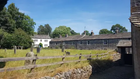 Photo of Kirkby Malham, a village in the Yorkshire Dales, North Yorkshire, northern England.