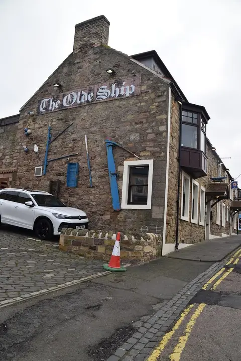 Photo of The Olde Ship Inn, a pub near Seahouses, Northumberland, north east England.