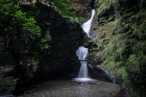 Photo of St Nectan's Glen, a waterfall near Tintagel, Cornwall, south west England.
