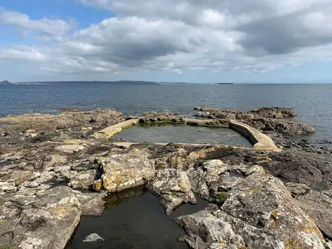 Photo of Mousehole Rock Pool, a sea pool in Cornwall, south west England.