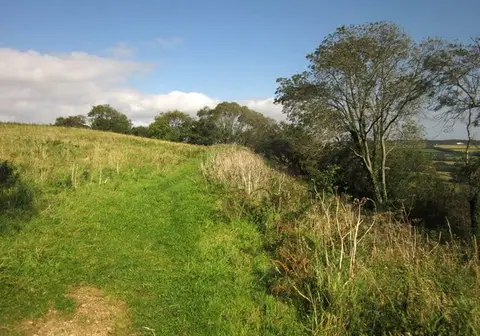 Photo of Musbury Castle, a ruined castle near Lyme Regis, Devon, south west England.