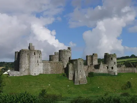 Photo of Kidwelly Castle, a ruined castle in Carmarthenshire, south west Wales.