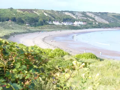 Photo of Port Eynon Bay, a beach in Gower, Swansea, south west Wales.