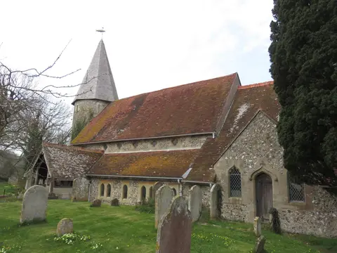 Photo of St John the Evangelist, a church near Piddinghoe in the South Downs, East Sussex, south east England.