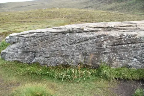 Photo of Dwarfie Stane, Hoy, a chambered tomb near Rackwick, the Orkney Islands, the Scottish Highlands and Islands.
