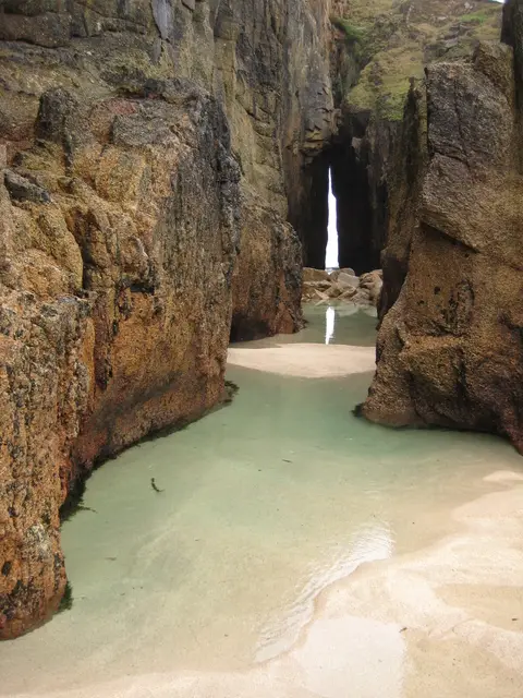 Photo of Nanjizal Beach, a cove near Sennen Cove, Cornwall, south west England.