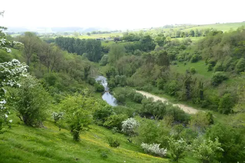 Photo of Lathkill Dale, a gorge near Over Haddon in the Peak District, Derbyshire, central England.
