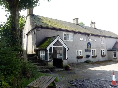 Photo of The Quiet Woman, a pub near Earl Sterndale in the Peak District, Derbyshire, central England.