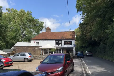 Photo of The Eight Bells, a pub near Jevington in the South Downs, East Sussex, south east England.