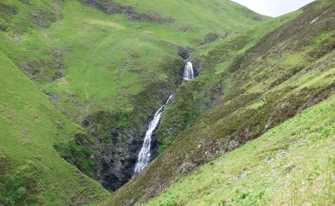 Photo of Grey Mare's Tail, a waterfall in Dumfries and Galloway, southern Scotland.