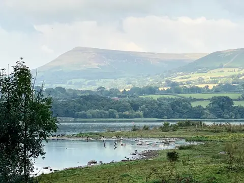 Photo of Llangorse Lake, a Lake near Llangorse (Llan-gors) in Bannau Brycheiniog, the Powys, mid Wales.