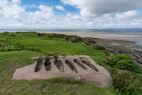 Photo of St Patrick's Chapel & Rock-cut Graves, a ruined chapel near Heysham, Lancashire, north west England.