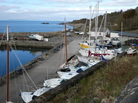 Photo of Dunure Harbour, a visitor attraction in South Ayrshire, southern Scotland.
