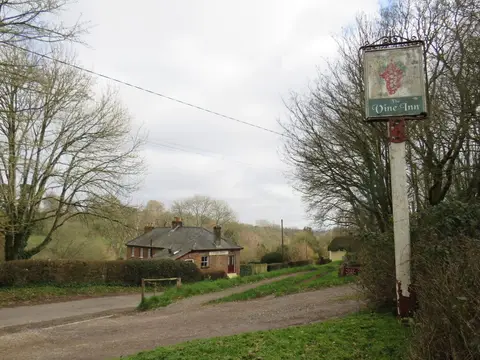Photo of The Vine Inn, a pub near Pamphill, Dorset, south west England.