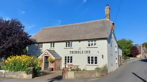 Photo of The Thimble Inn, a pub near Piddlehinton, Dorset, south west England.