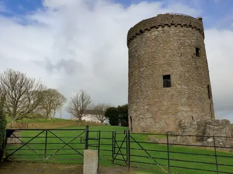 Photo of Orchardton Tower, a ruined tower house near Palnackie in the East Stewartry Coast, Dumfries and Galloway, southern Scotland.