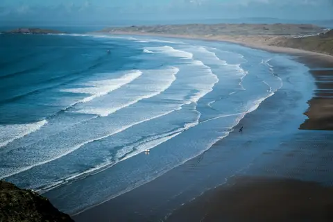 Photo of Rhossili Bay, a beach in Gower, Swansea, south west Wales.