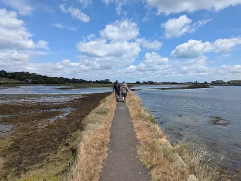 Photo of Brading Marshes to St. Helen's Ledges, a Site of Special Scientific Interest near Bembridge, the Isle of Wight, south east England.