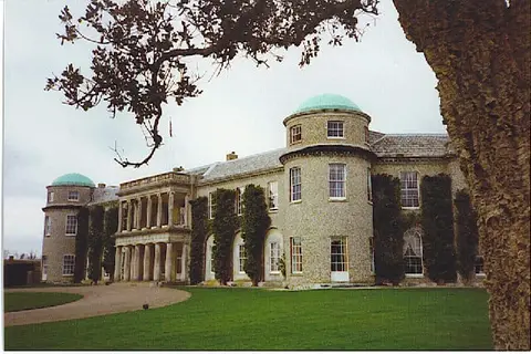 Photo of Goodwood House, a Grade I registered house & garden near Charlton in the South Downs, West Sussex, south east England.