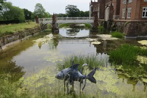 Photo of Helmingham Hall, a Grade I registered house & garden near Debenham, Suffolk, eastern England.