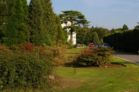 Photo of Ticehurst House Hospital, a Grade II* registered house & garden in the High Weald, East Sussex, south east England.