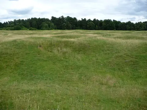 Photo of Grime's Graves, a flint mine near Brandon, Norfolk, eastern England.