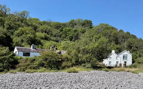 Photo of Pwlldu Bay, a cove near Bishopston in Gower, Swansea, south west Wales.